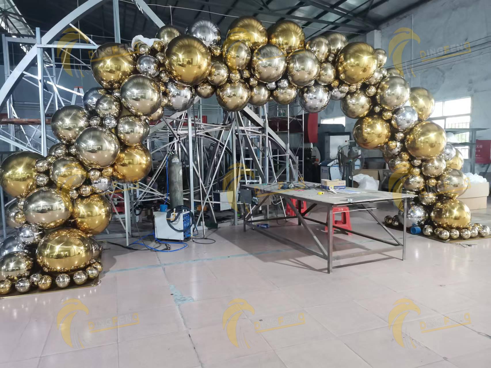 Gold Sphere Arch Installation
