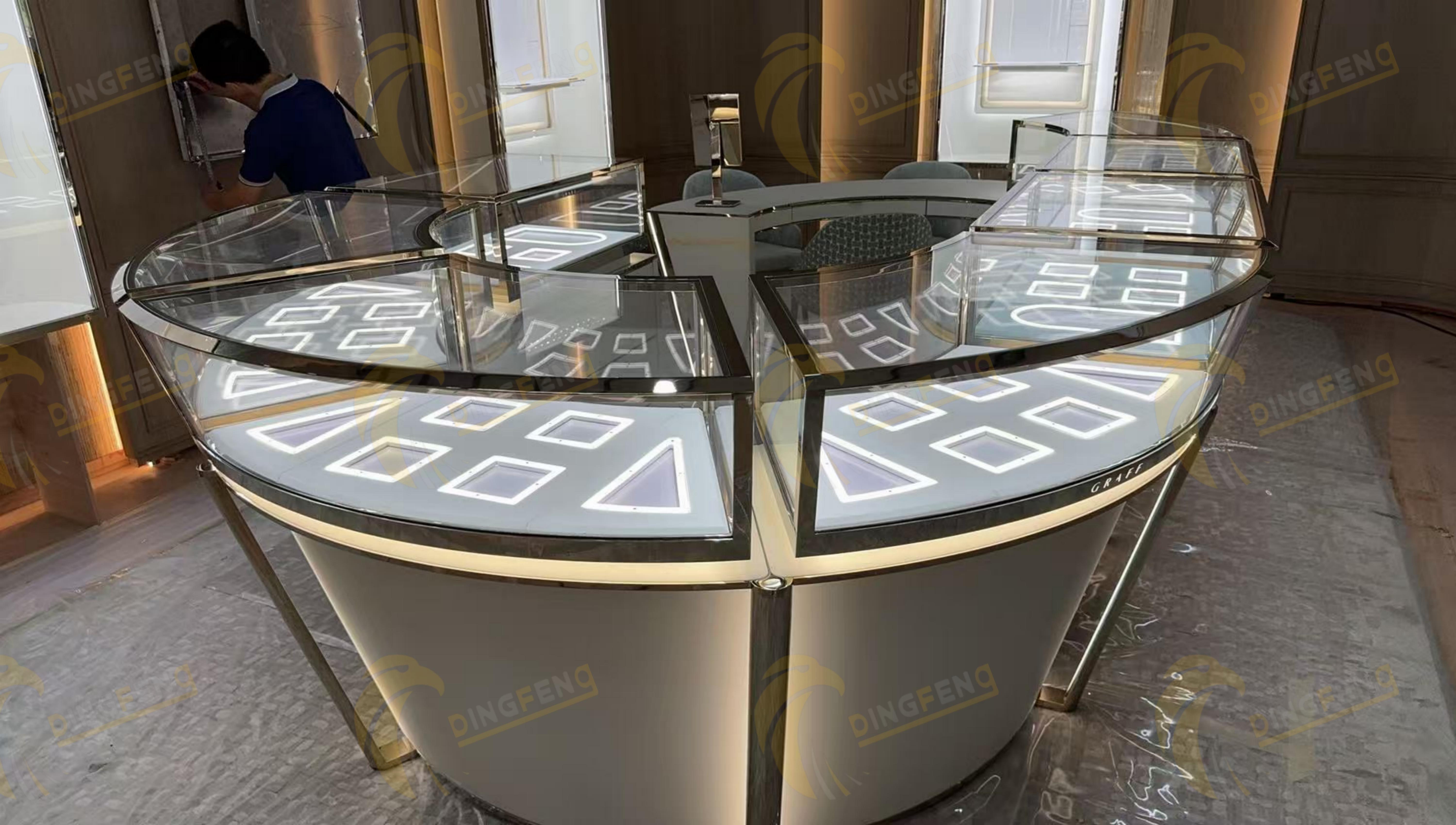 tempered glass showcases with metal frames and integrated lighting